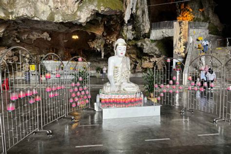 The Majestic Kek Lok Tong Temple: Exploring Ancient Caves and Intricate Buddhist Sculptures!